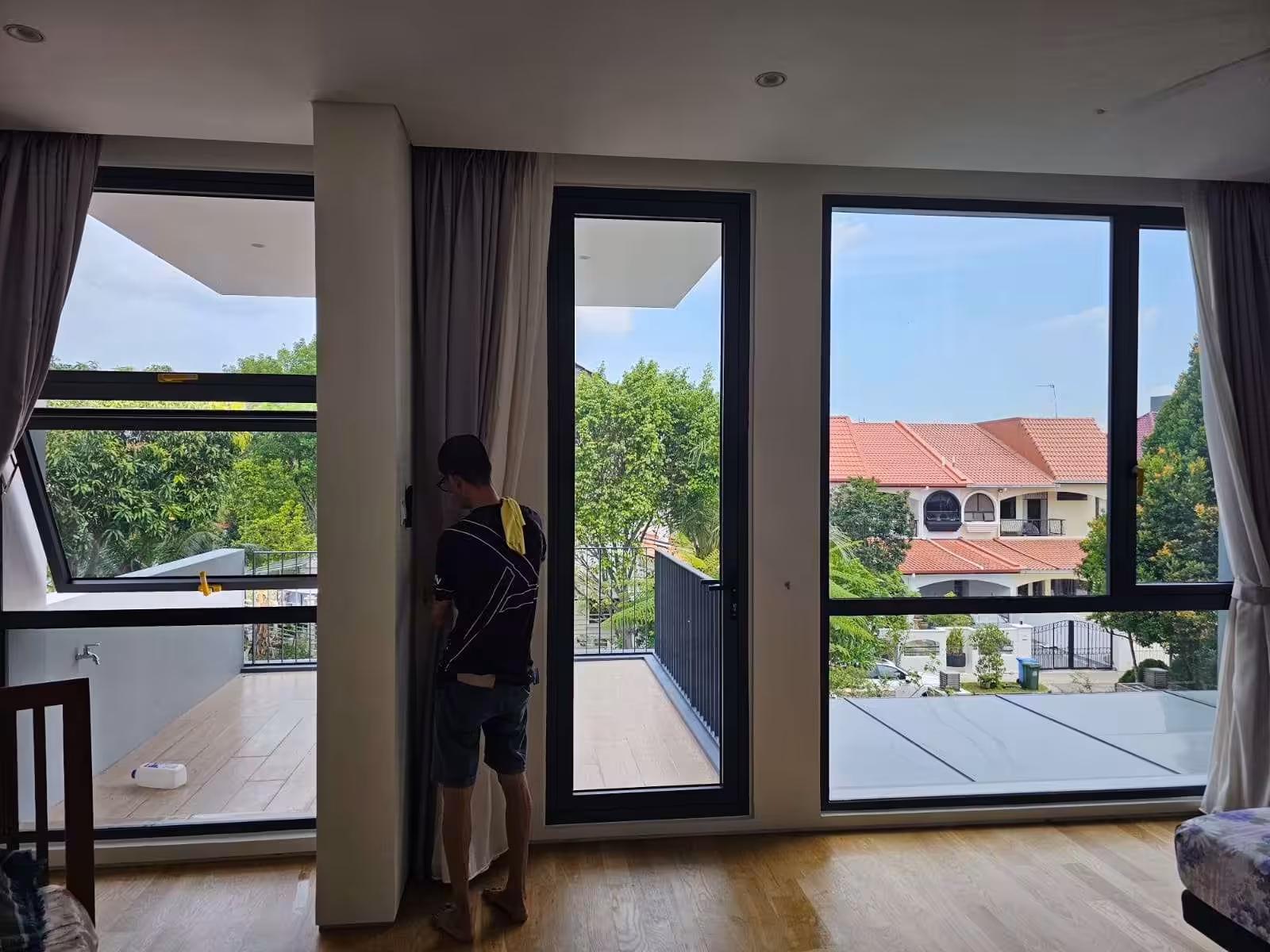 3M Prestige window film 3M PR 40 Zenith Window Films - 3M window film on full-height balcony glass in a Singapore home